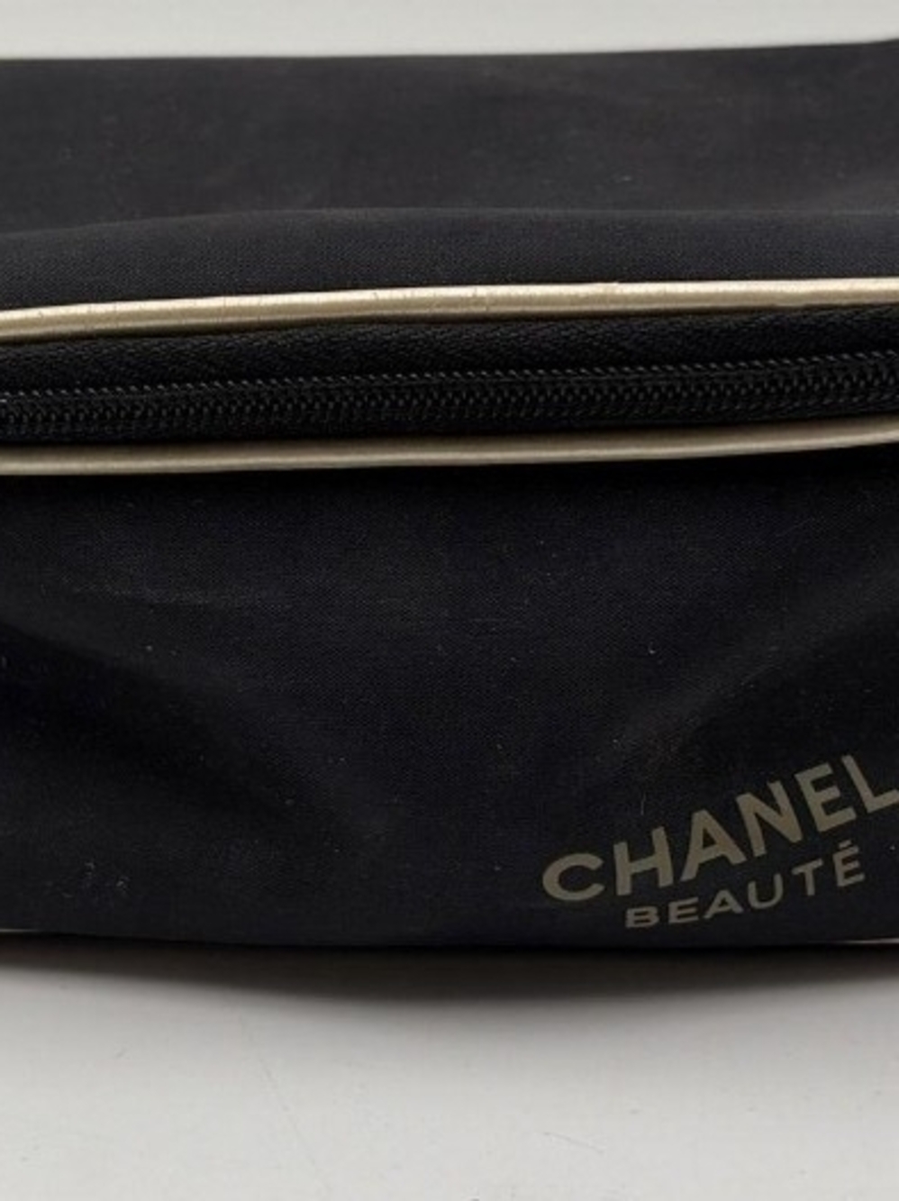 CHANEL Black Cosmetic Pouch with Gold Accent